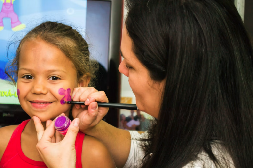 child getting face paint